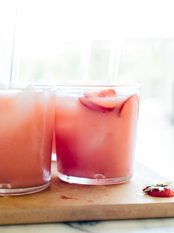 This pink drink is my interpretation of the Starbucks drink. Made with hibiscus tea, orange juice and coconut milk, this punch recipe is fresh, fruity and super refreshing. cookieandkate.com