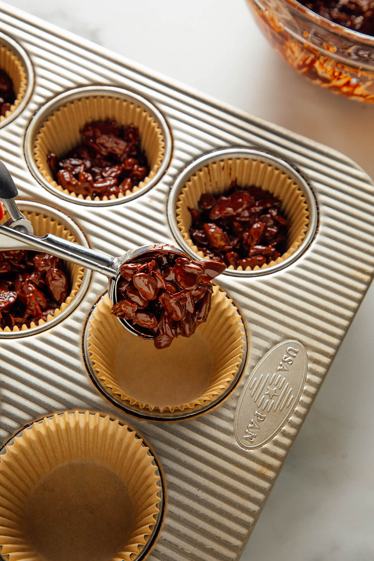 scooping chocolate mixture